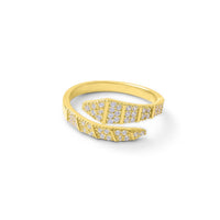 A gold-filled ring with a coiled design and encrusted with cubic zirconia, displayed against a white background.