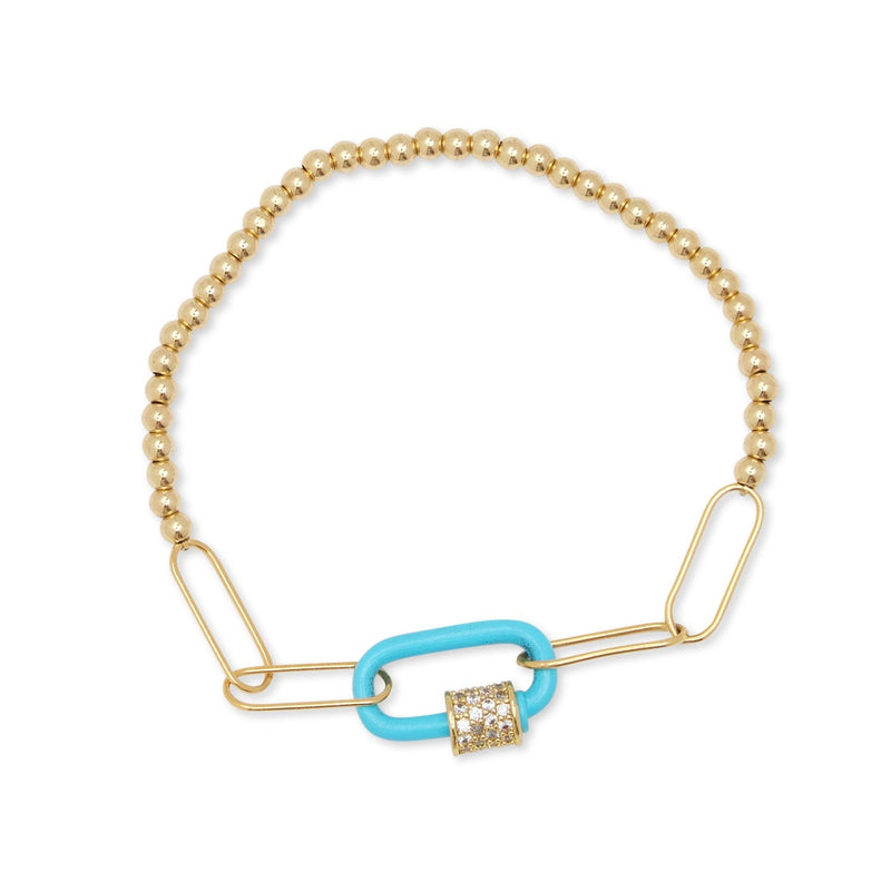 Gold bracelet with a blue link and diamond charm on a white background