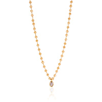 Amber beaded necklace with solitaire oval pendant. 16