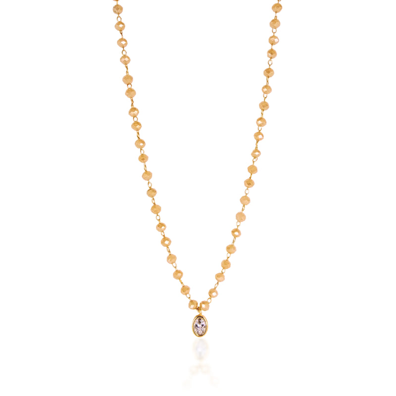 Amber beaded necklace with solitaire oval pendant. 16