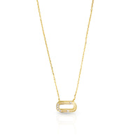 Gold necklace with a unique pendant on a white background