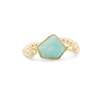 A gold-filled bubble ring with a teal semi-precious gemstone accent.