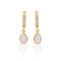 A pair of gold-plated opal earrings with cubic zirconia accents, designed as huggies.
