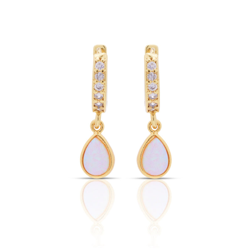 A pair of gold-plated opal earrings with cubic zirconia accents, designed as huggies.